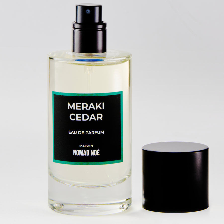 Meraki Cedar Eau de Parfum bottle and cap Maison Nomad Noé